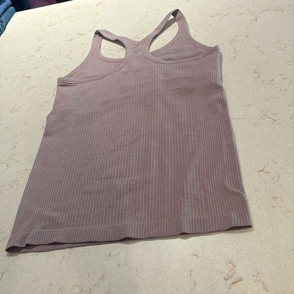 Lululemon Ebb to street tank ll SZ 6
Figue. Four way stretch.
Yoga
Athletic wear - Picture 7 of 16
